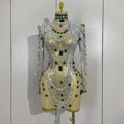 Sparkly mesh see through mini dress with diamond accents and long sleeves