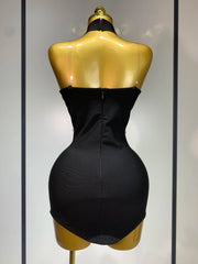 Jamilah strapless mini bodycon dress with rhinestone chain detailing and backless design for women’s birthday or evening parties.