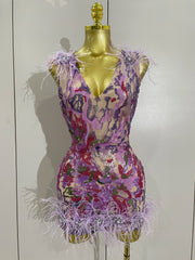 Celebrate in style with the Karina rhinestone feather embroidered bodycon dress. Elegant party dress for birthdays, cocktails, and special events.