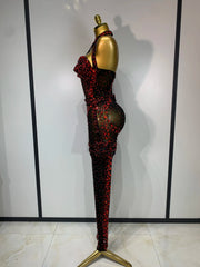 Turn heads in the Amanda backless red rhinestone black mesh jumpsuit. Sparkly bodycon outfit for stage performances, parties, and birthdays.