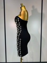 Strapless pearl and rhinestone bodycon mini dress with backless design