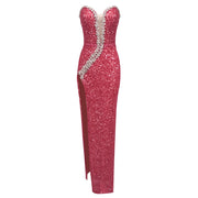 Lyra strapless backless maxi dress with diamond sequins, styled for formal events and high-glamour occasions.