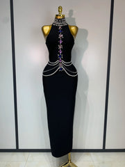 Gwen sleeveless bandage dress in a bodycon fit featuring luxury diamond crystal embellishments and a sculpted silhouette.