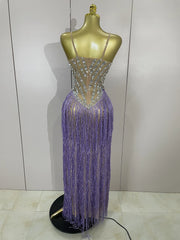 Cleo sheer mesh long dress with rhinestones, glitter, and tassel details for women’s evening, club, or stage wear.
