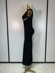 Caroline black long sleeve beaded maxi bandage dress for evening parties, birthdays, or formal events.
