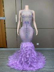 Chanel sparkly purple rhinestone feather floor-length prom dress.