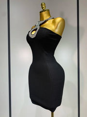 Nyra backless black bandage mini dress featuring a bodycon fit and hand-applied sparkly diamond embellishments.