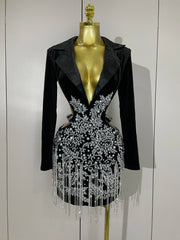 Naomi black hollow-out mini dress with diamond accents and tassels for women’s evening parties, birthdays, or stage events.