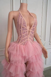 Tiana pink sheer rhinestone prom dress with deep V-neck and sparkling details.