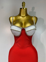 Red backless bodycon maxi dress with diamond embellishments.
