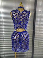 Amber crystal mesh two piece bodycon mini dress set for women. Sexy outfit for nightlife, stage wear, and party events.