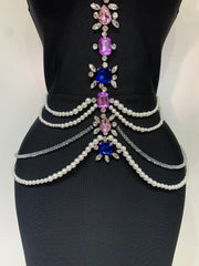 Gwen sleeveless bandage dress in a bodycon fit featuring luxury diamond crystal embellishments and a sculpted silhouette.