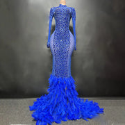 Sparkling feather long prom dress with rhinestones and elegant evening gown design.