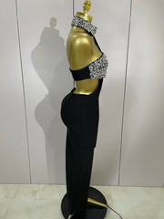 Shine in the Rhian black crystal rhinestone backless bodycon bandage dress. Elegant party dress for birthdays, cocktails, and evening events.
