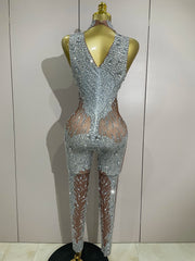 Luxury sleeveless rhinestone bodycon jumpsuit with sparkling crystals for stage or night-out wear.