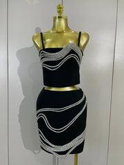 Shine in the Kristi diamond chain two-piece bandage mini dress set. Sexy bodycon outfit for parties, birthdays, clubs, and special events.