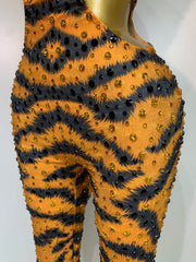 Sparkly rhinestone tiger pattern tight fitting jumpsuit for women, luxury party and stage outfit.