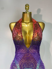 Stand out in the Raiz colorful rhinestone mesh bodycon jumpsuit. Sexy V-neck outfit for stage performances, parties, birthdays, and events.