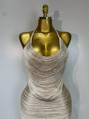 Cloe sleeveless backless bandage midi dress featuring decorative tassel details and a fitted bodycon silhouette