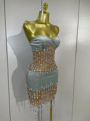 Leilani strapless sheer mesh mini dress with sparkling rhinestones and pearl chain embellishments
