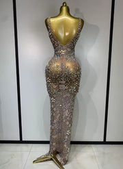 Eniola sheer mesh long dress encrusted with luxury diamonds for a high-fashion, see-through evening look.