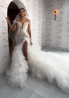 Luxury rhinestone glitter beaded wedding dress with feather hem for glamorous bridal look