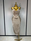 Cloe sleeveless backless bandage midi dress featuring decorative tassel details and a fitted bodycon silhouette