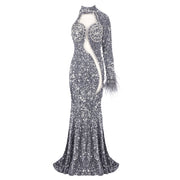 Amara one-shoulder gray sequin gown with feather details, elegant long evening dress for parties and formal occasions.