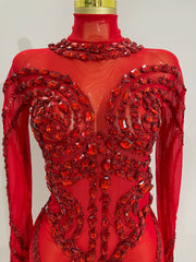 Luxury sheer rhinestone mesh jumpsuit with glittering diamonds and sequins for festival or stage wear.