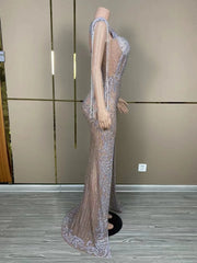 Sexy mesh see-through prom gown with a high split and shimmering silver fringe. Tia Valentine party dress.