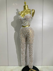 Shine in the Diane rhinestone lace halter top and wide-leg pants set. Elegant two-piece outfit for parties, birthdays, and special occasions.