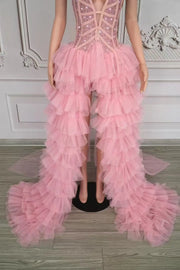 Tiana pink sheer rhinestone prom dress with deep V-neck and sparkling details.