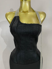 Black strapless bodycon bandage dress with sparkly diamond embellishments and tassel details for women’s party and birthday wear.