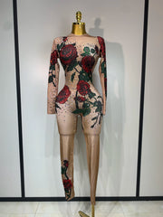 Khai wearing a rose print sparkly rhinestone jumpsuit for a luxury prom look.