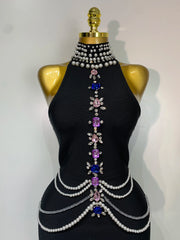 Gwen sleeveless bandage dress in a bodycon fit featuring luxury diamond crystal embellishments and a sculpted silhouette.