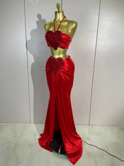 Danita two-piece outfit featuring a halter crop top and matching long maxi skirt for an elegant party look