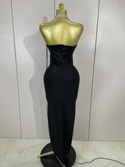 Black strapless bodycon bandage dress with sparkly diamond embellishments and tassel details for women’s party and birthday wear.