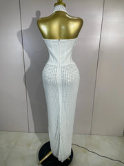 Jan halter bandage maxi dress featuring sheer mesh details and sparkling rhinestone embellishments