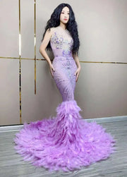Chanel sparkly purple rhinestone feather floor-length prom dress.