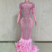 Sparkling feather long prom dress with rhinestones and elegant evening gown design.