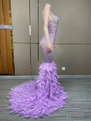 Chanel sparkly purple rhinestone feather floor-length prom dress.