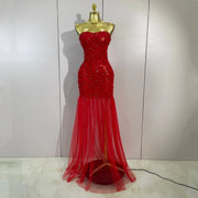 Reiley rhinestone strapless mesh see through mini dress for women. Sexy sparkly outfit for birthdays, nightlife, and parties.