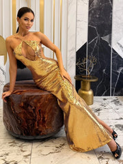 Soraya gold sequin luxury gown with structured bodice and flowing silhouette, styled for formal parties and glamorous occasions.