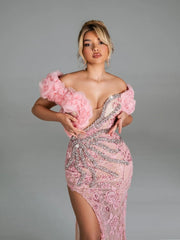 Off shoulder 3D floral prom dress with side slit and floor length silhouette.