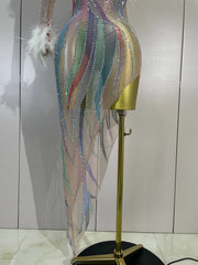 Turn heads in the Wendy one-shoulder rhinestone feather dress. Sexy sheer bodycon party dress for birthdays, cocktails, and evening events.