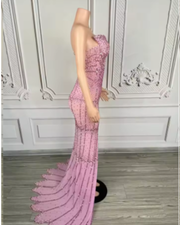 Nylah strapless rhinestone prom dress with high slit and see-through mesh design.