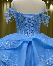 Bejeweled off-shoulder gown with 3D floral lace and star embellishments for proms, galas, or special occasions.