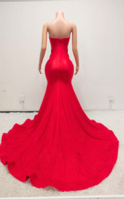 Eden Red mermaid evening gown with sheer beaded corset bodice and flowing train for evening events, birthdays, or stage appearances.