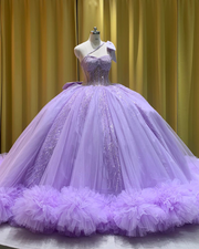 Lilac one shoulder corset ball gown with corset bodice and cloud ruffle hem