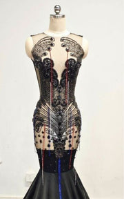 Luxury prom dress featuring intricate beadwork and mermaid silhouette